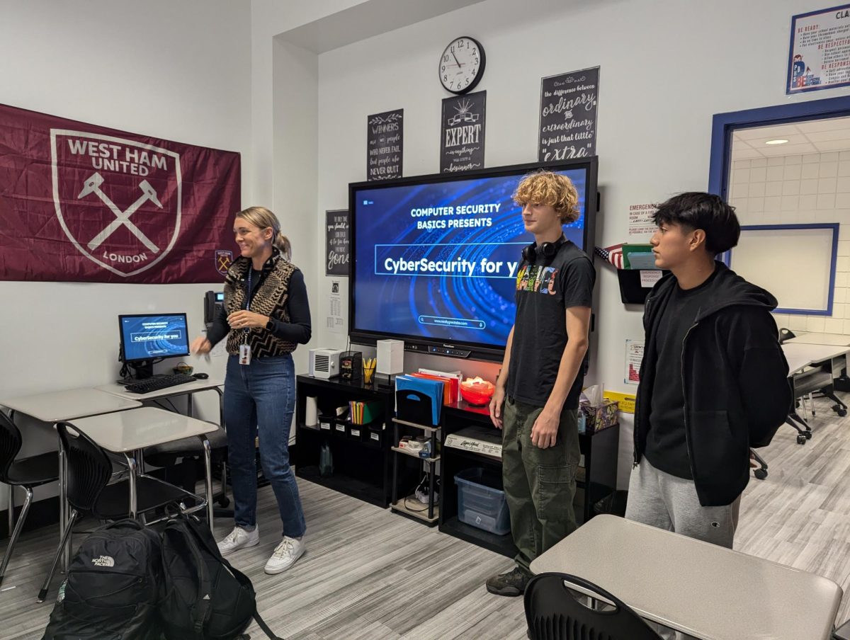 Ms. Peterson's class does an informative presentation in Mr. Tabone's class.